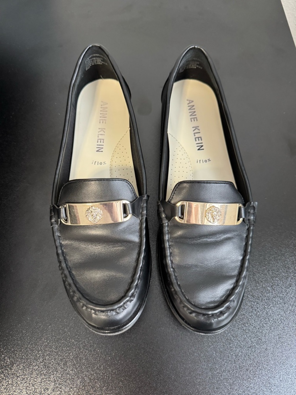 Anne Klein Black Leather Loafers with Gold-Tone Emblem